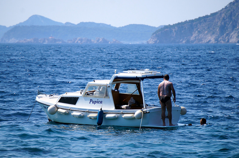 Local dude and his boat. You're welcome ladies.